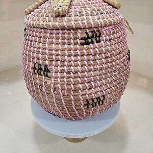Basket with lid pink and black accents.